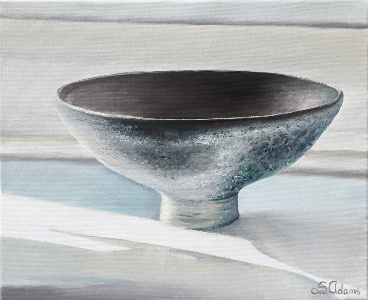 Oil painting of a footed grey-green bowl on a pale striped surface.